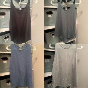 Four pairs of Nike Dri-fit tank tops